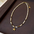 Titanium steel starfish pendant necklace with natural shell and tigereye beads on a 41-50cm chain.