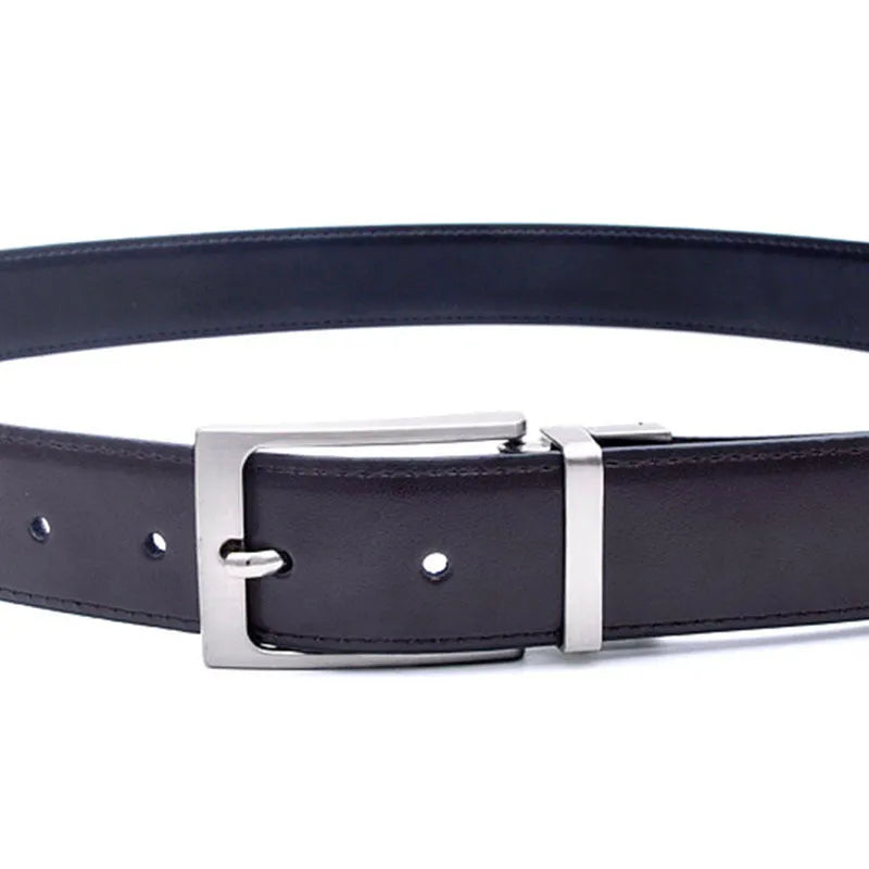 Men's dark brown and black genuine leather belt with a silver rotating pin buckle laid flat.
