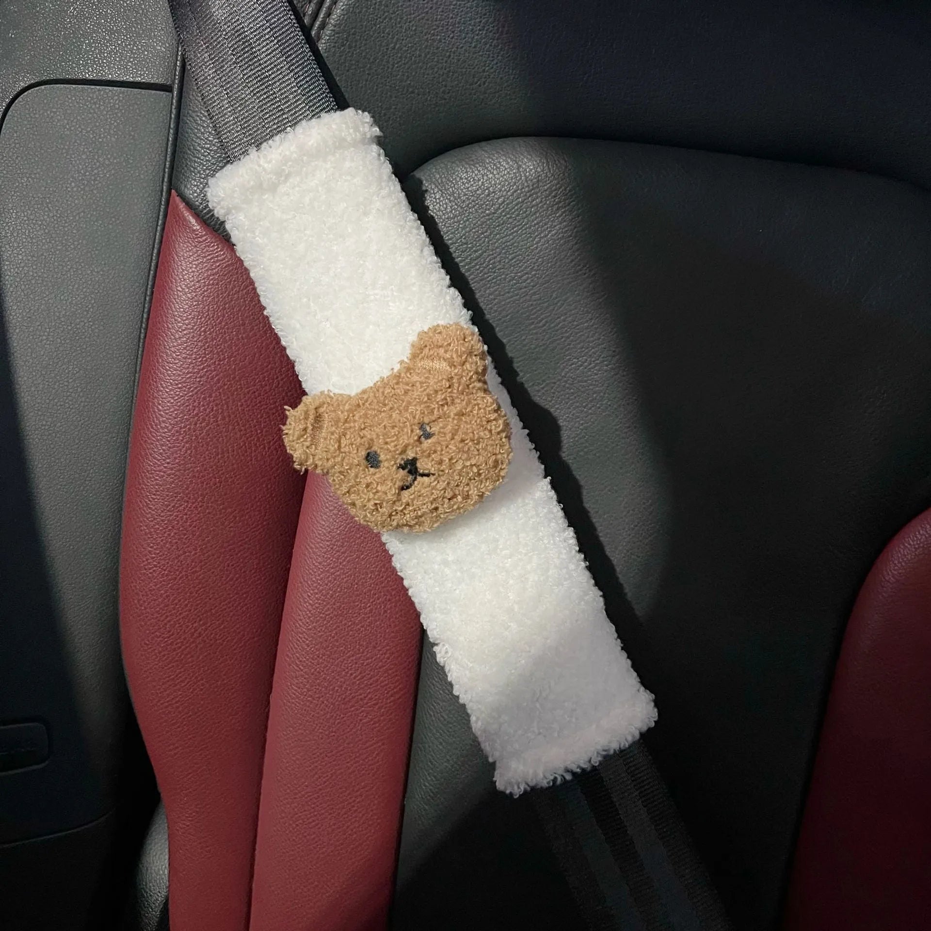 Cartoon bear plush baby car seat belt protective cover showing khaki and coffee colour options