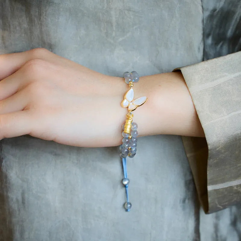 Gray moonstone woven bracelet for women with butterfly hand rope design and geometric retro style