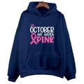 Women's pink sweatshirt with 'I'm A Survivor' retro graphic print and a side seam pocket.