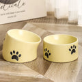 Ceramic cat food bowl with high foot and cat's paw print in chosen colour.