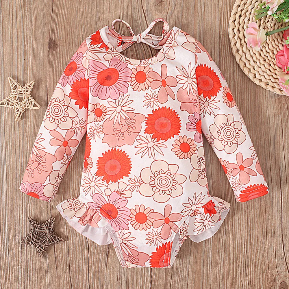 Girl's pattern graphic print crew neck open back swimsuit in orange red with flower design, polyester fabric