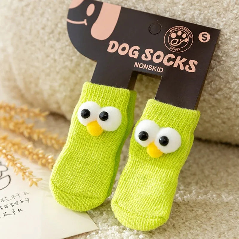 Dog all-season universal socks with cute big eyes and anti-slip particles on the bottom, in green colour