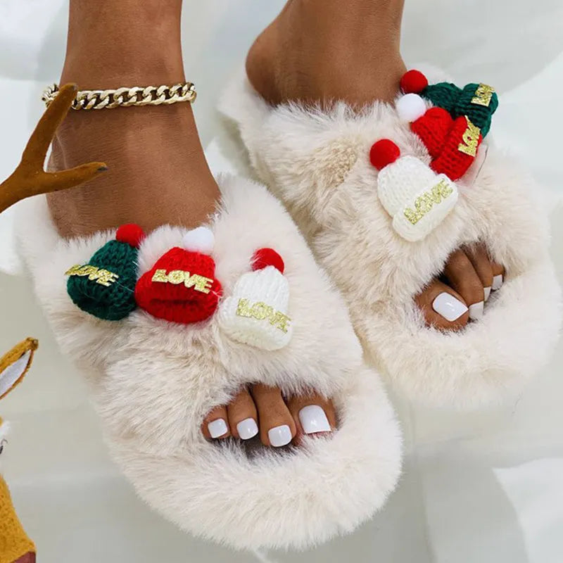 Women's Christmas hat decoration faux plush slippers with cotton lining and a rubber sole.