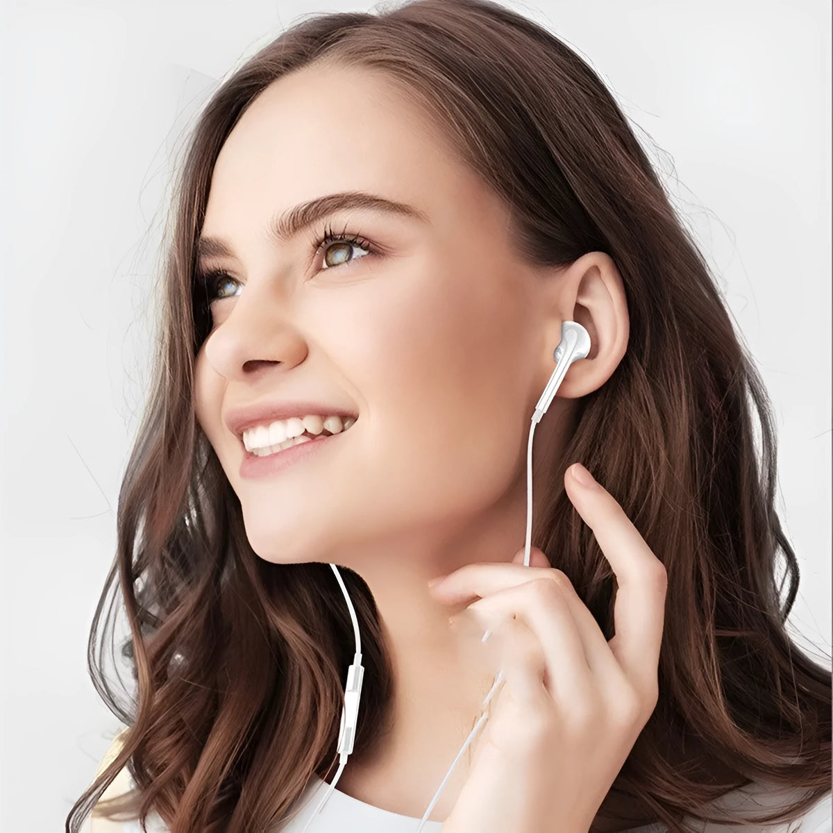 Wire-controlled Bluetooth in-ear headphones with wired connection, moving coil driver, and microphone