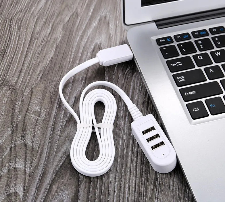 Cable separator hub with 3 USB ports and Micro USB interface on a desk