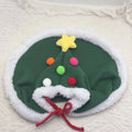 Cat Christmas cape with velvet stars hat in green, adjustable ties, side view on a cat