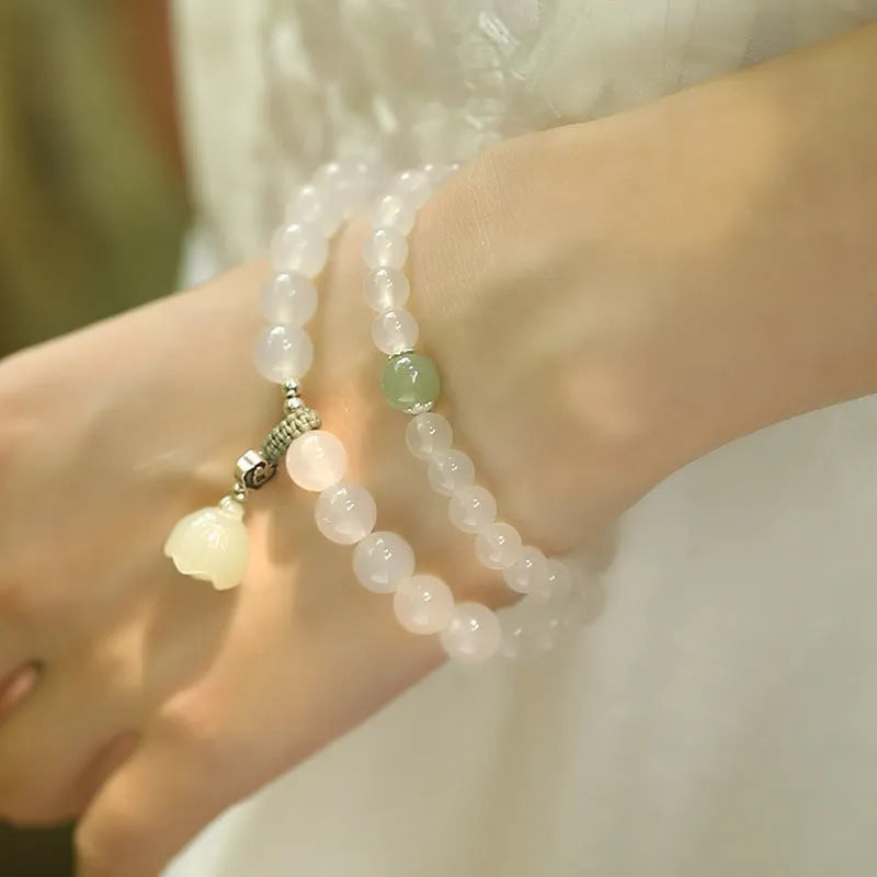White agate and Hetian jade beads on a geometric S925 sterling silver lotus bracelet for women.