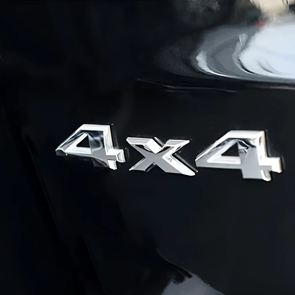 Metal 3D 4x4 rear car badge sticker in silver plated finish on a vehicle boot