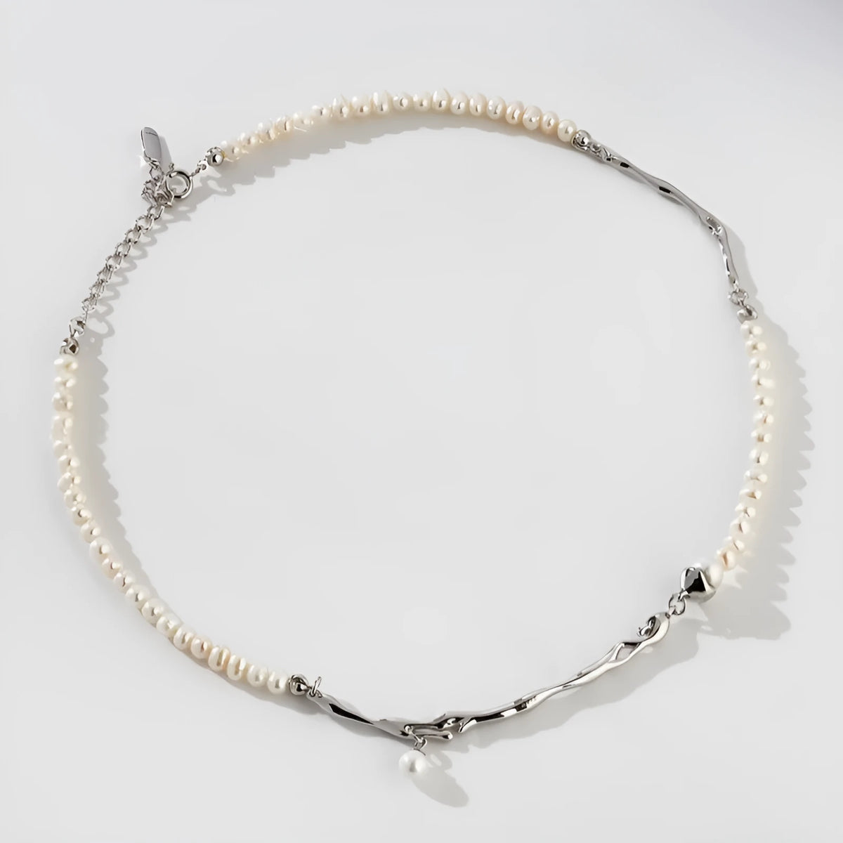 Stitching niche design unisex imitation pearl necklace with copper electroplated pendant in silver, O-ring chain