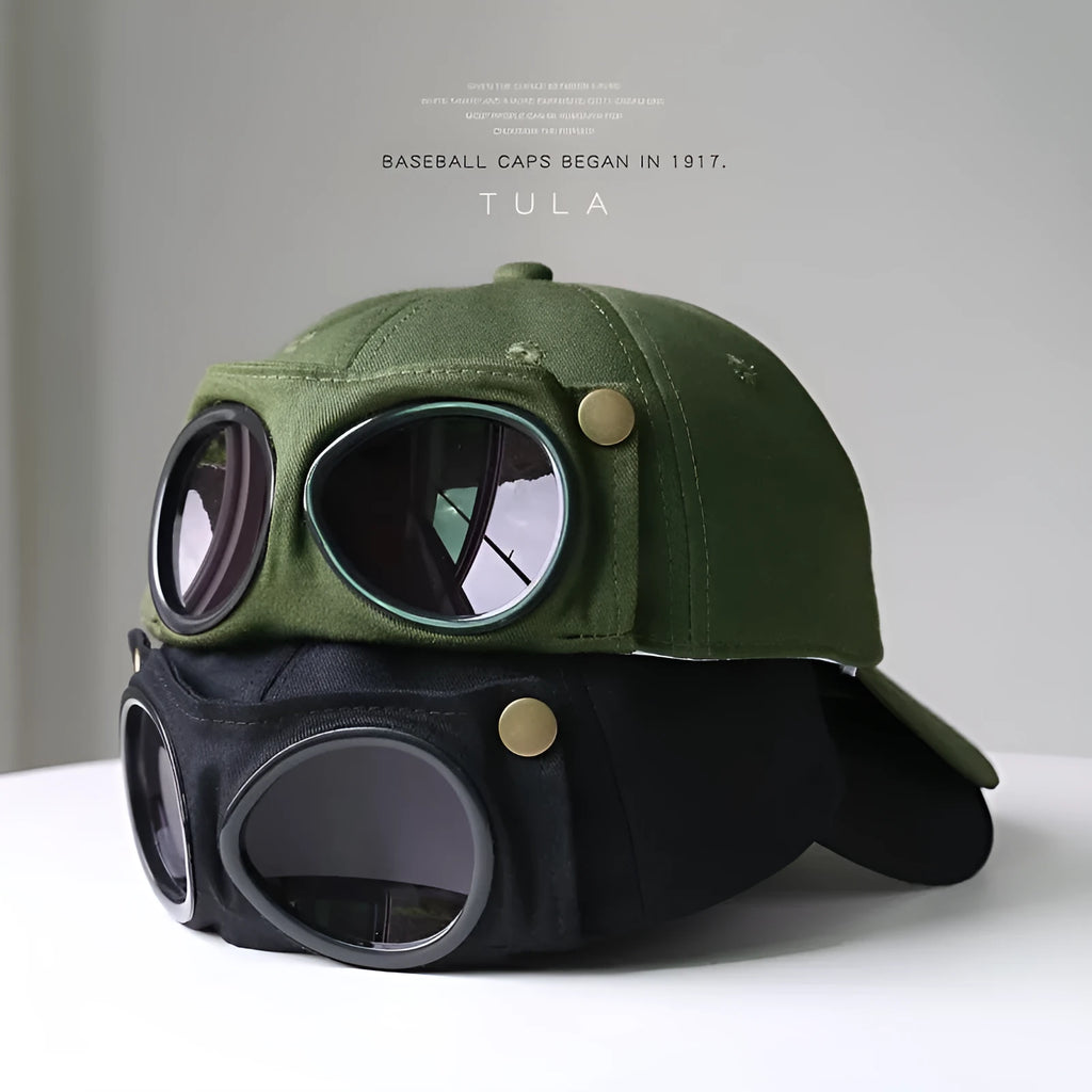 Men's cotton peaked cap in free size with dome crown, satin processing, and letter detailing, shown in monochrome design.