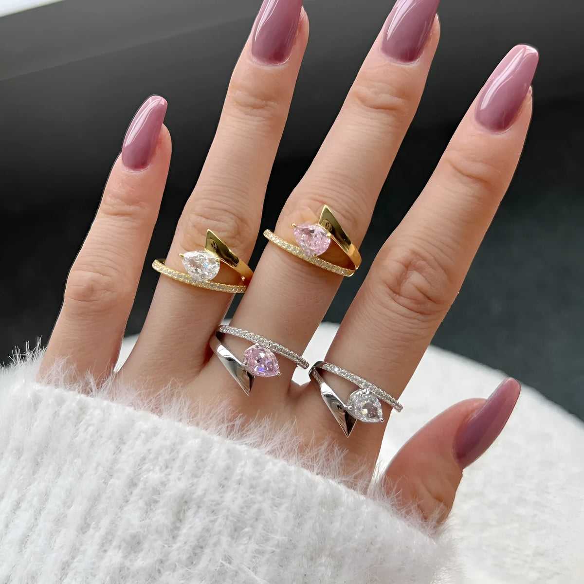 Women's silver water drop ring with electroplating and geometric teardrop design, shown in a listed colour option