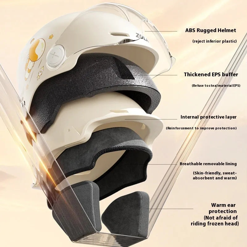 Khaki coloured open-face motorcycle helmet with a mirrored sun visor attached on a table.