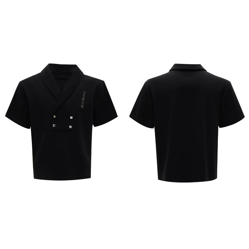 Men's dark grey cotton sports suit with V-neck short-sleeve jacket, padded shoulders, metal embellishments, and matching shorts.
