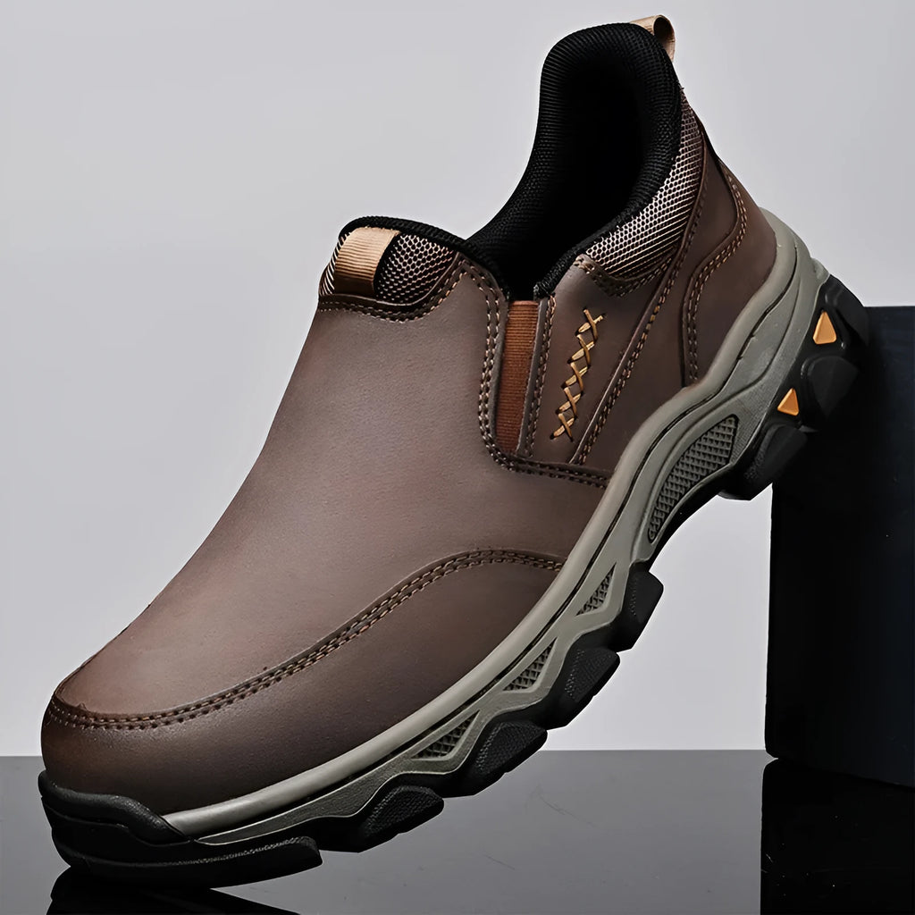 Men's dark brown casual leather shoes with round toe and flat rubber sole.
