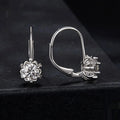Sterling silver flower bud ear clip with moissanite stone and white gold plating