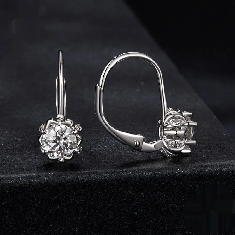 Sterling silver flower bud ear clip with moissanite stone and white gold plating