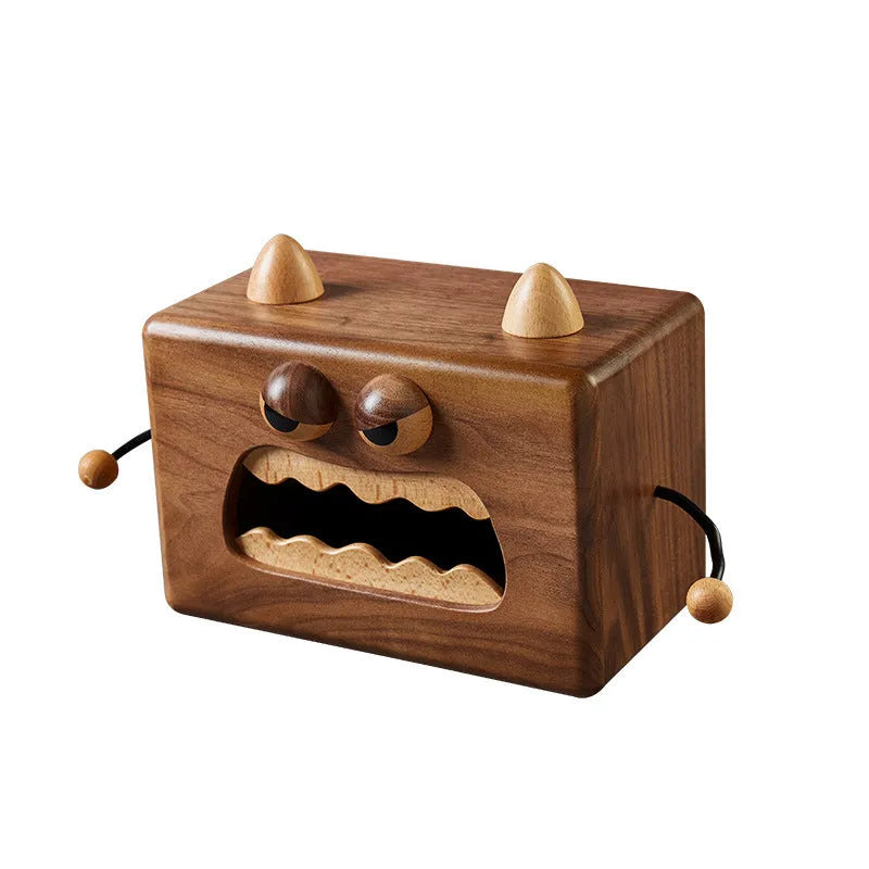 Wooden cartoon Little Monster tissue box in walnut beech finish, 190mm long by 104mm wide by 125mm tall