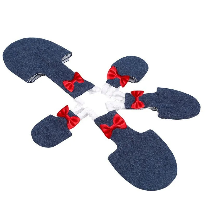 Parrot wearing a denim-style nappy diaper with metal fastenings, size L, on a perch