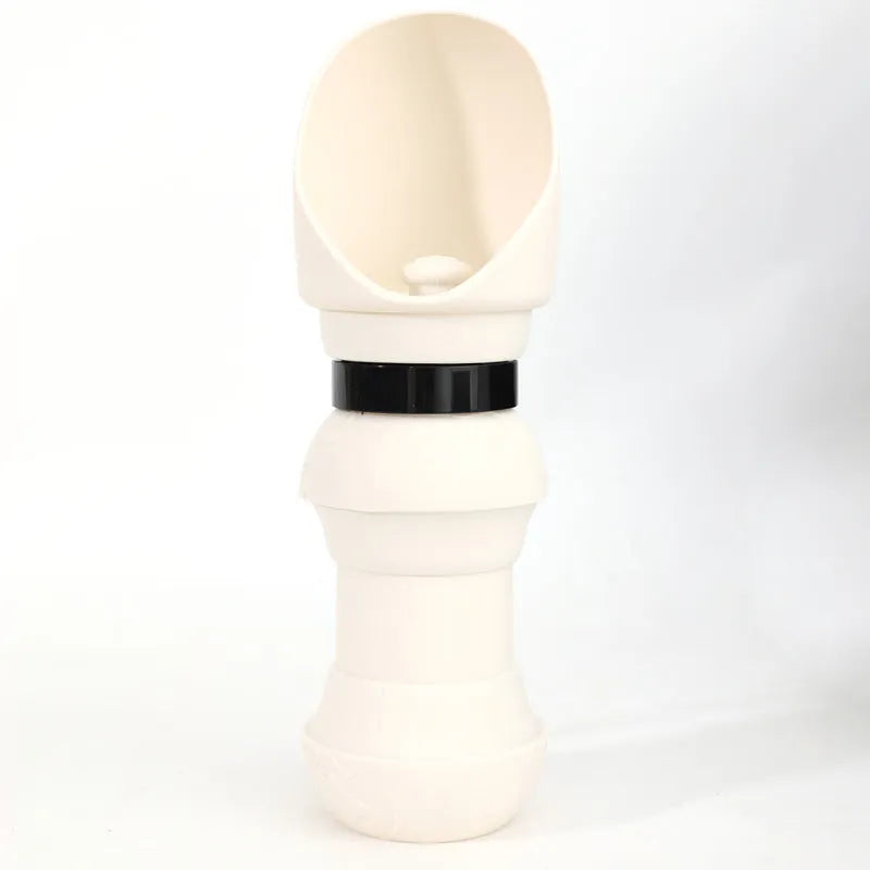 Soft silicone pet folding water cup shown in a choice of colours, collapsed and expanded next to a dog lead.