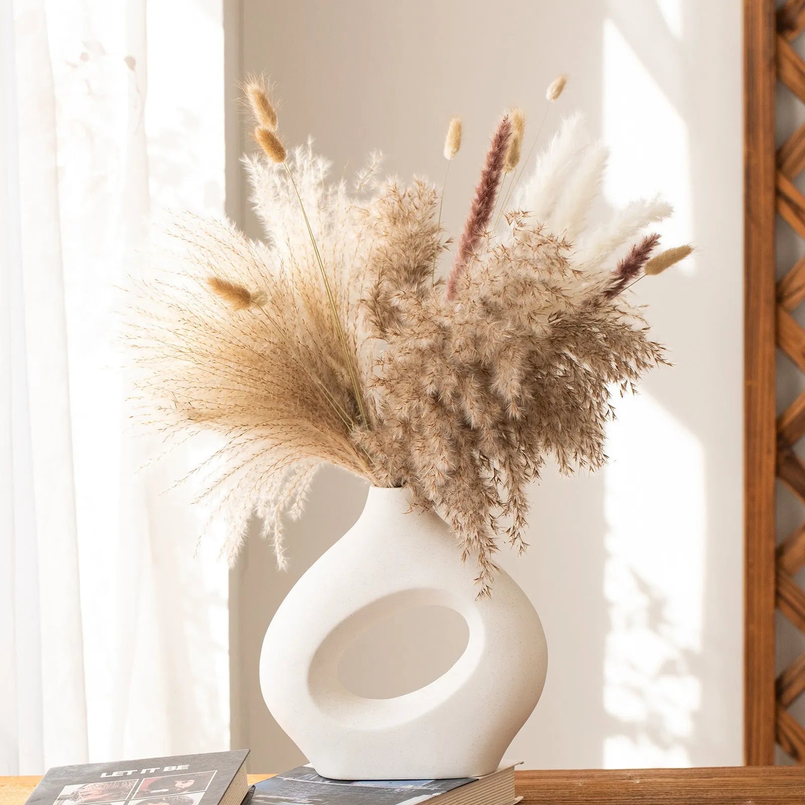 Ceramic soft vase second generation, handmade glazed, white large size on a table as decorative centrepiece