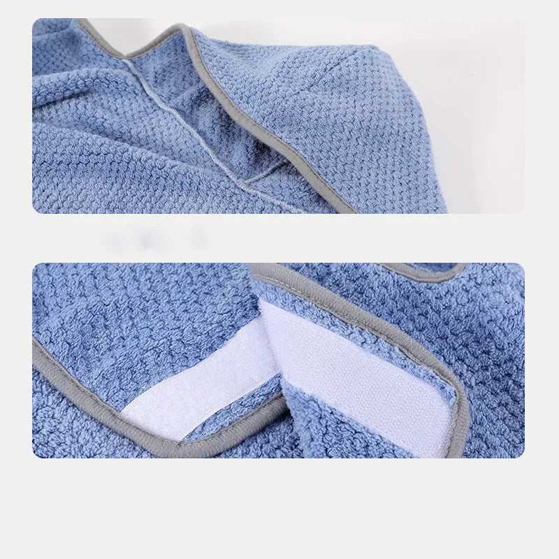 Blue dog bath robe towel with adjustable waistband on a medium-sized dog after a bath