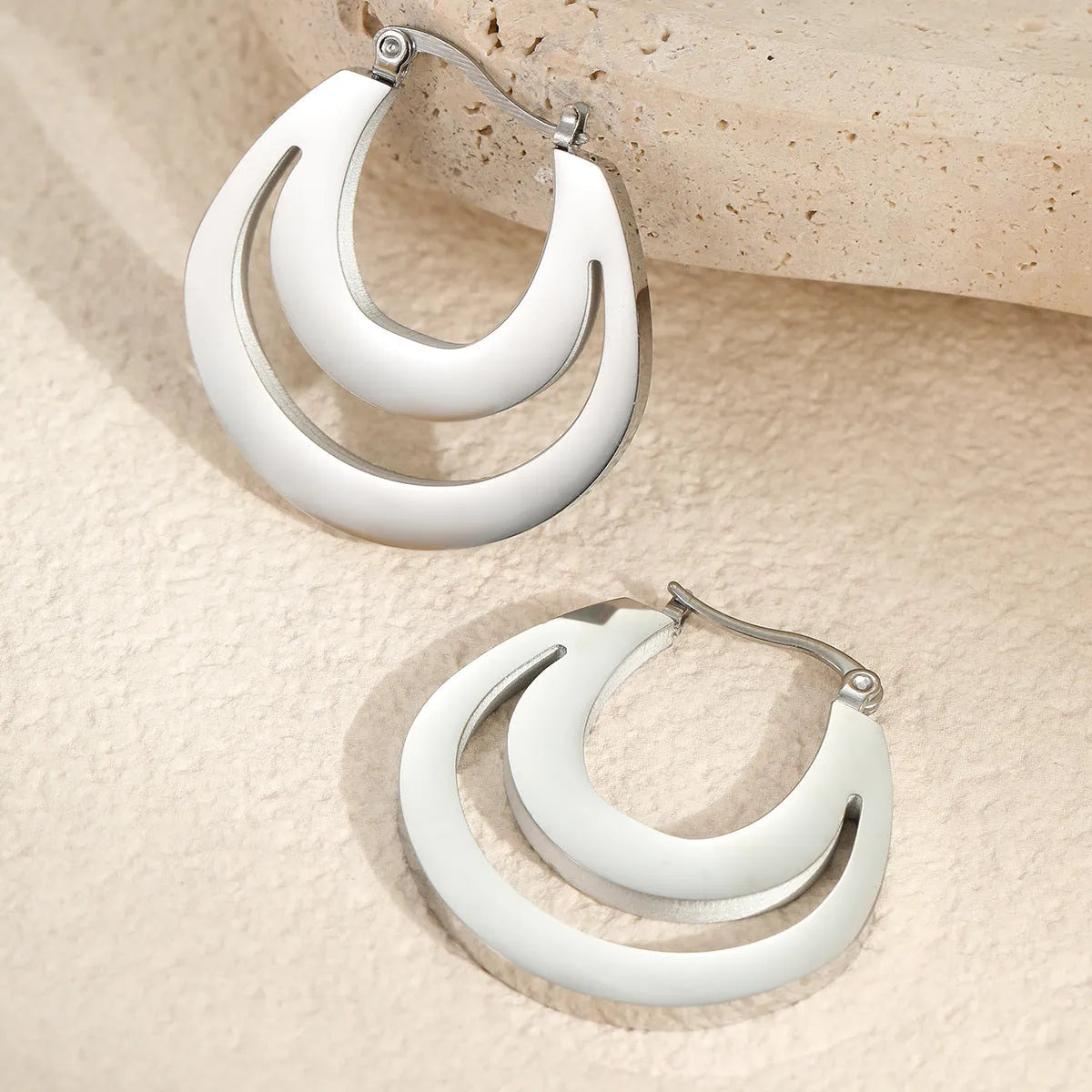 Gold plated geometric French earrings with round ring design on stainless steel with 18K purity plating