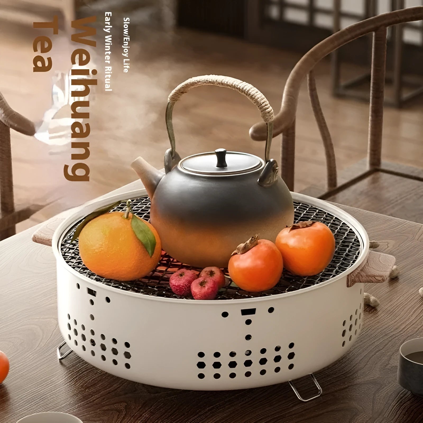 Modern indoor portable charcoal cooking stove with a detachable circular grill rack on top.