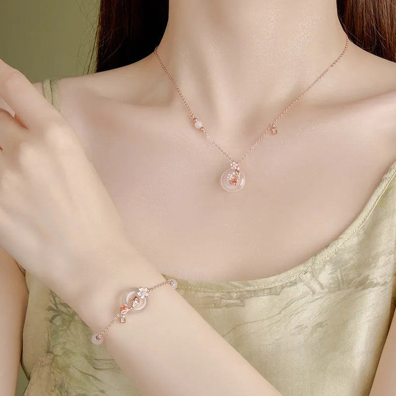 S925 sterling silver bracelet with white chalcedony crystal in a koi bracelet design for women.