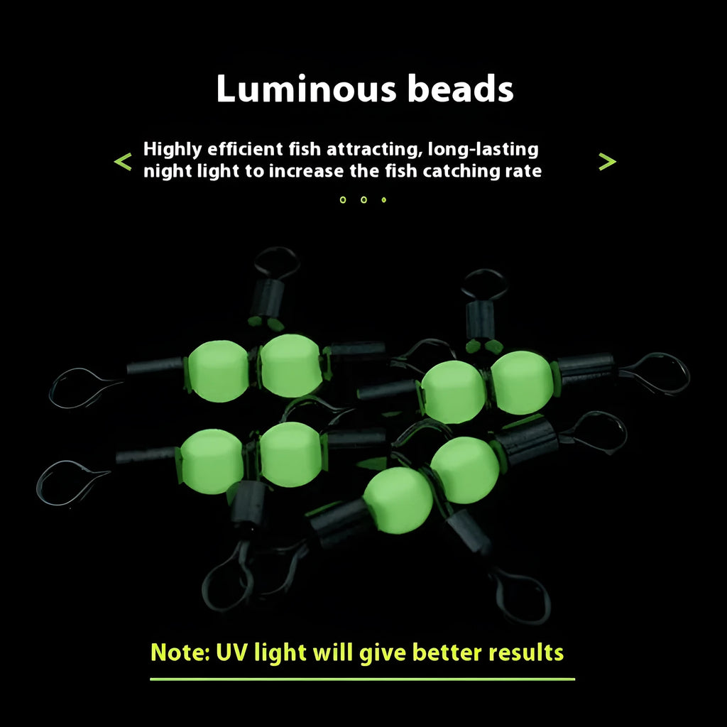 Copper fishing swivel with three forks, eight small balance rings, and glowing luminous beads on a dark background.