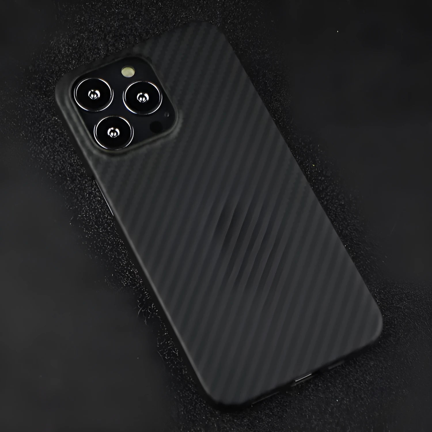 Slim Kevlar fibre iPhone back case with stripe detail and textured black finish.