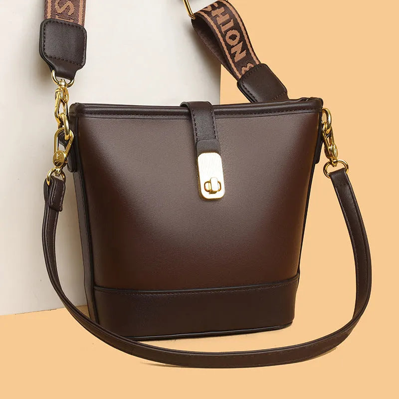 Korean style black bucket shoulder bag with adjustable straps and organised interior compartments
