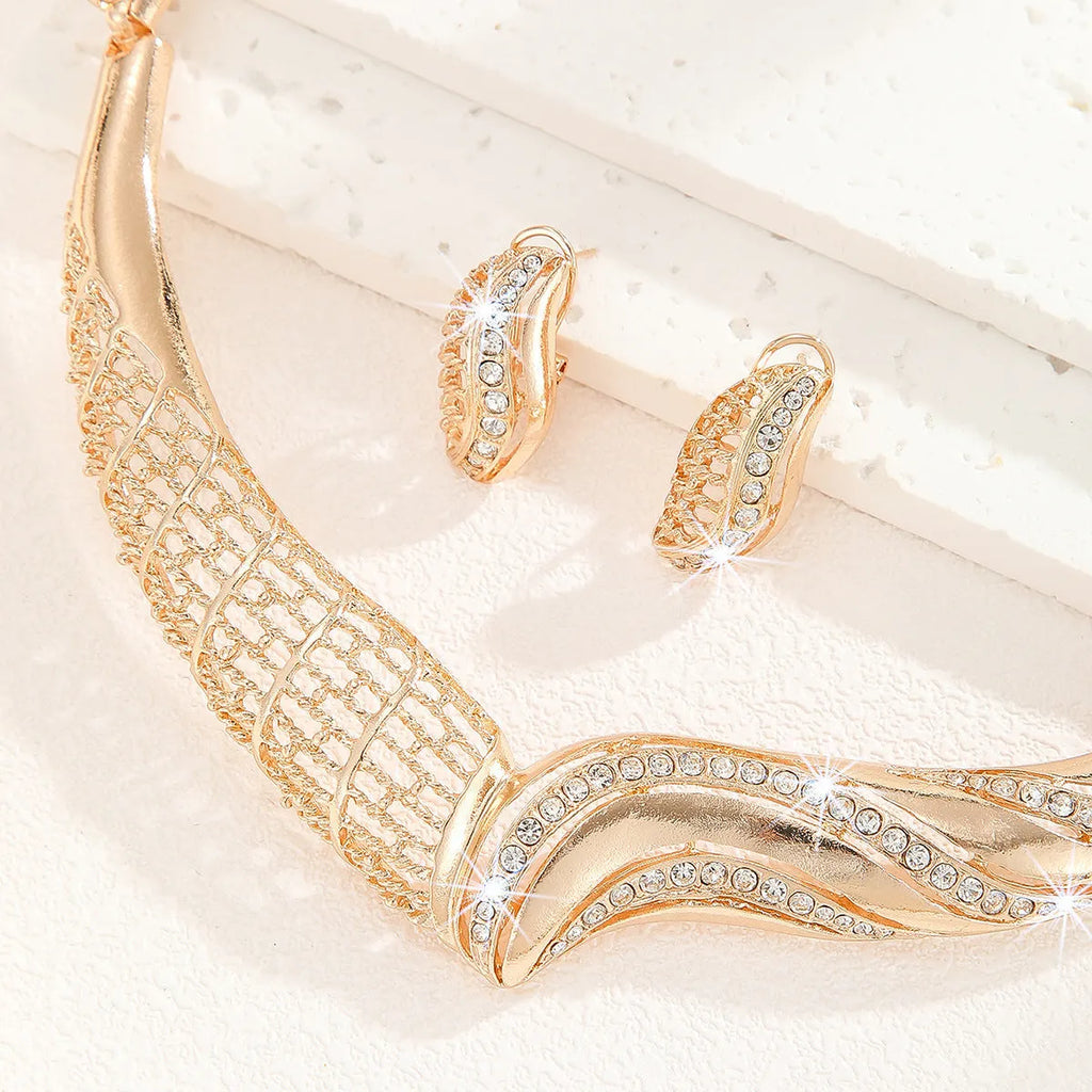 Gold-tone alloy necklace and earrings set for women with heart, water drop and bell motifs