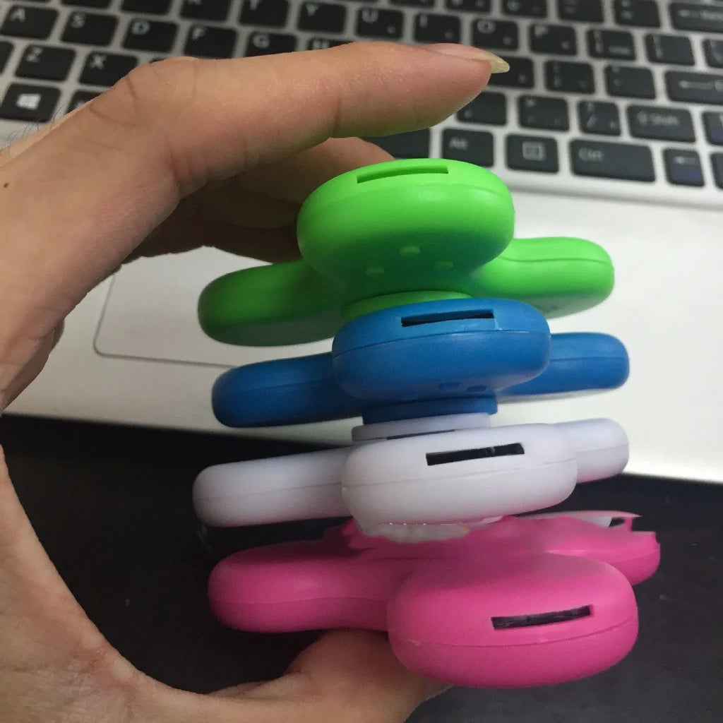 Bluetooth speaker fidget spinner in ABS plastic with 80mm diameter, shown in blue colour option