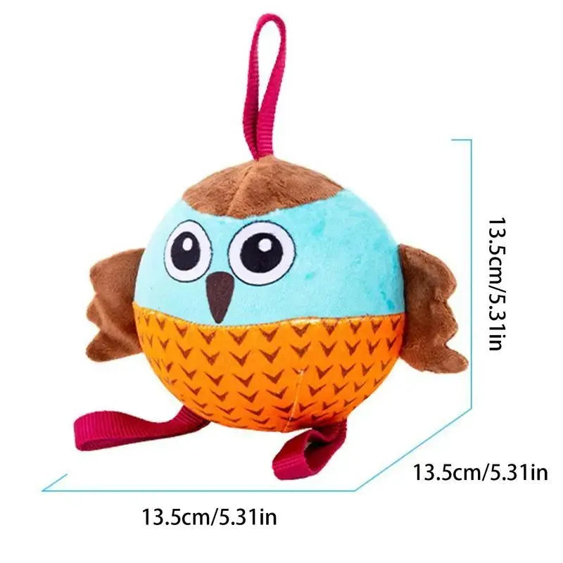 Orange Owl Ball interactive dog toy with velvet surface and rubber core on white background