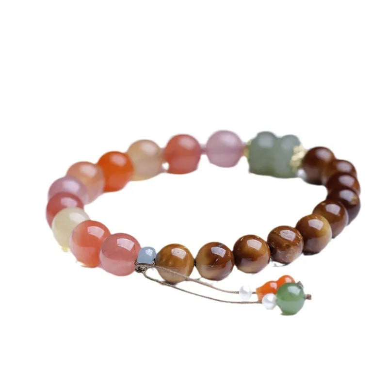 Women's 8mm agate bracelet with diamond-shaped beads and persimmon elements