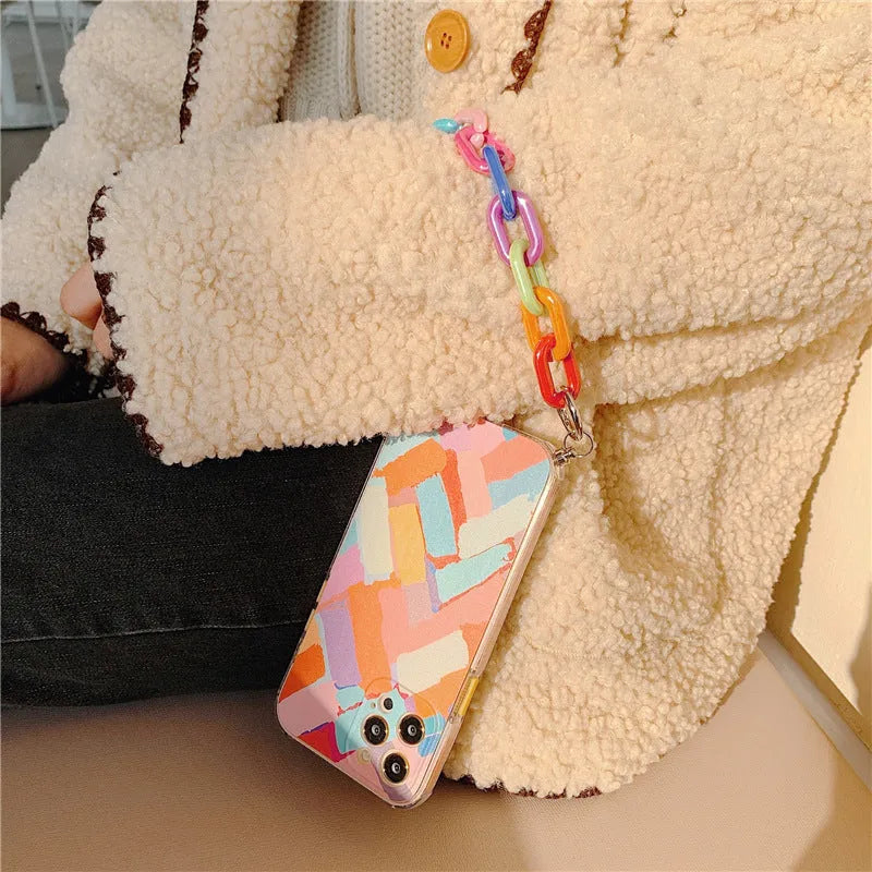 Personalised TPU mobile phone case with graffiti design and integrated wrist bracelet