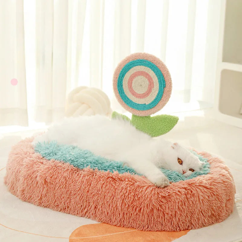 Pink elliptical plush cat bed with removable cover for winter warmth