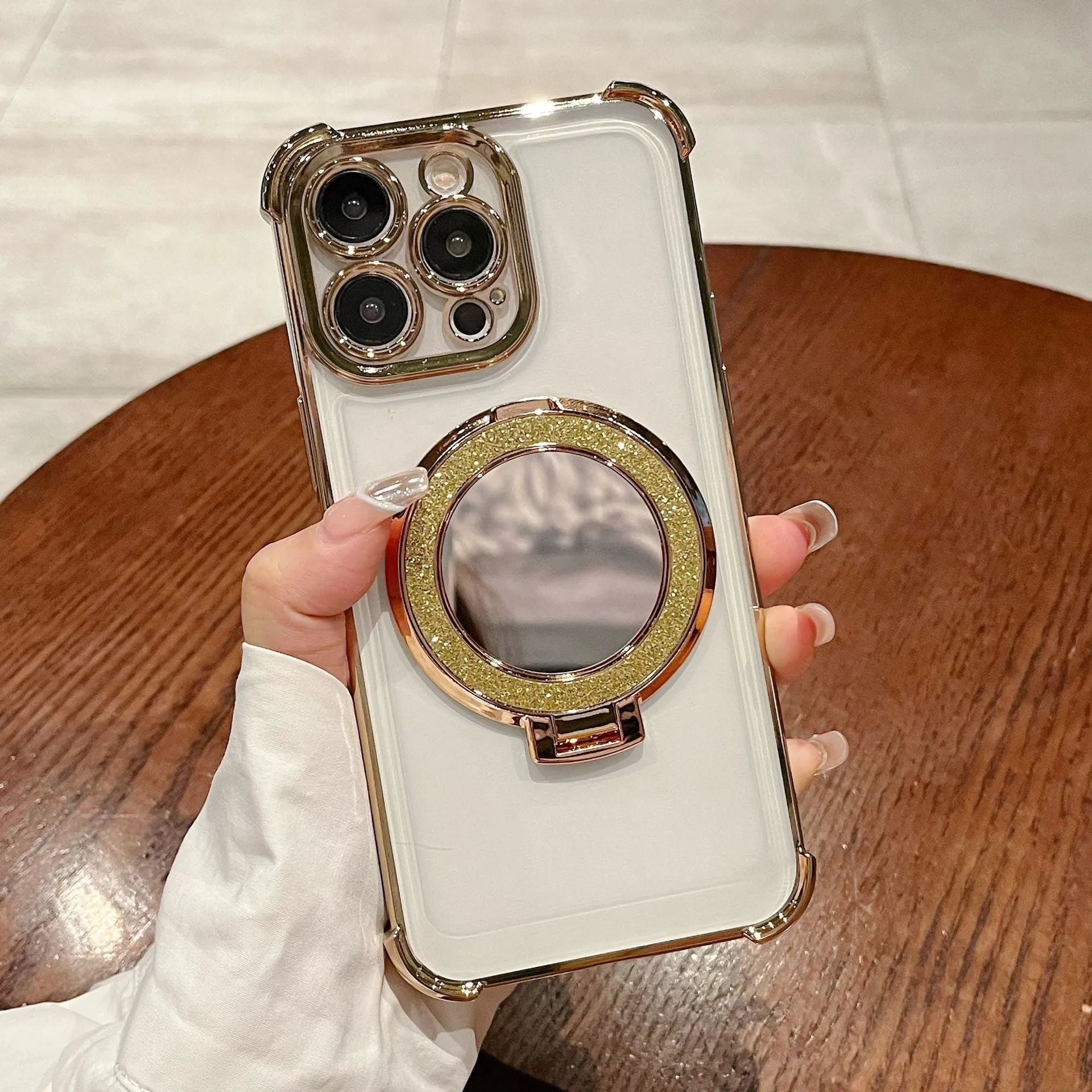 Glitter mirror magnetic bracket phone case for iPhone 16 in black, showing bracket and mirror finish.