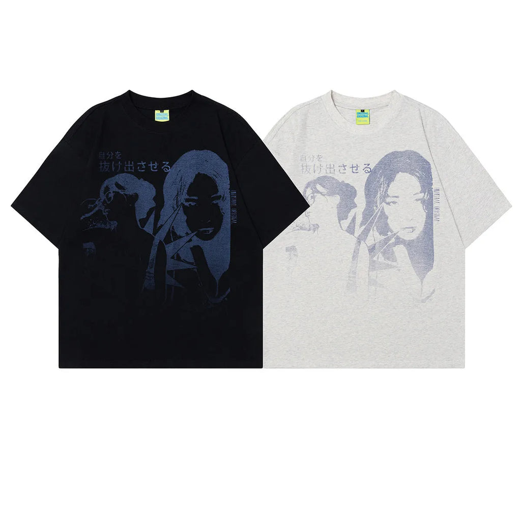 Men's grey loose-fit cotton t-shirt featuring a retro character design print on the chest.