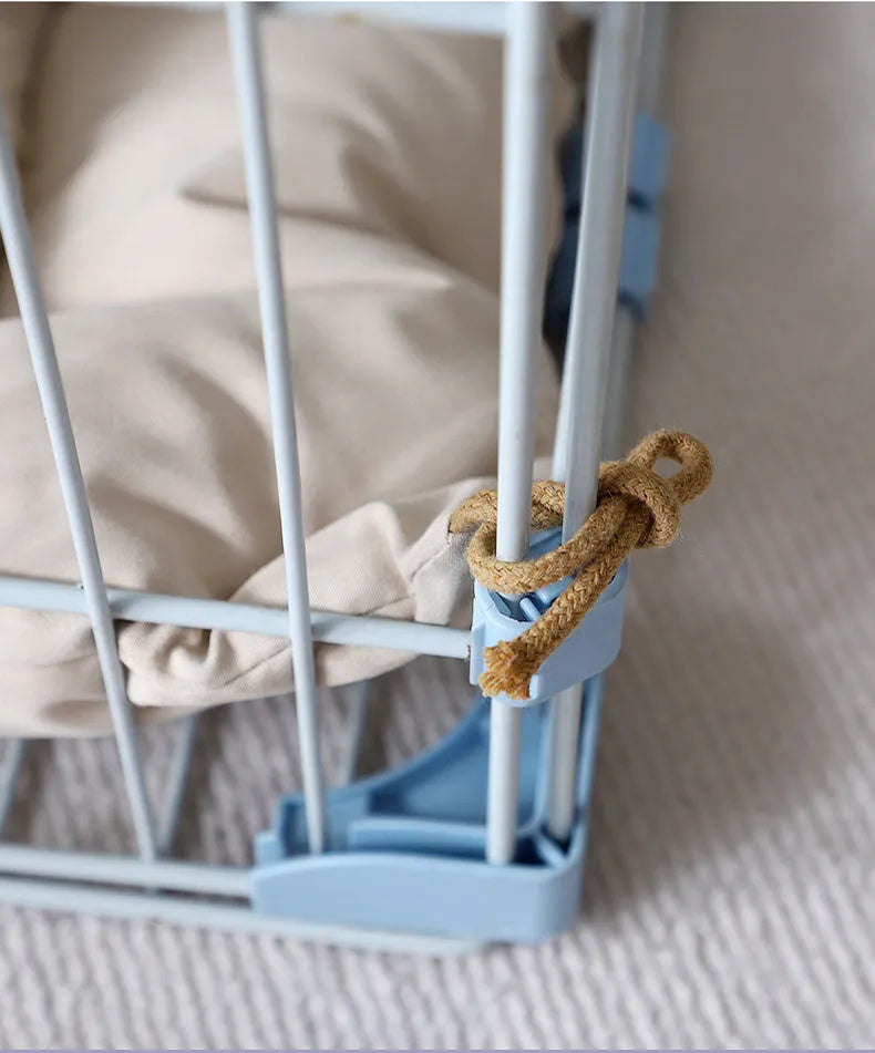 Beige tied cage cushion for small dog in crate showing secure attachment and warm bedding platform.