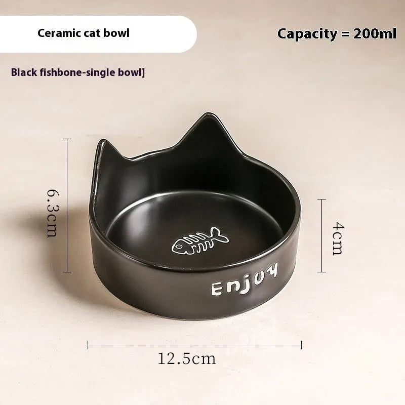 Porcelain cat bowl with cat ear and paw design on a wooden feeding frame, in pink colour.