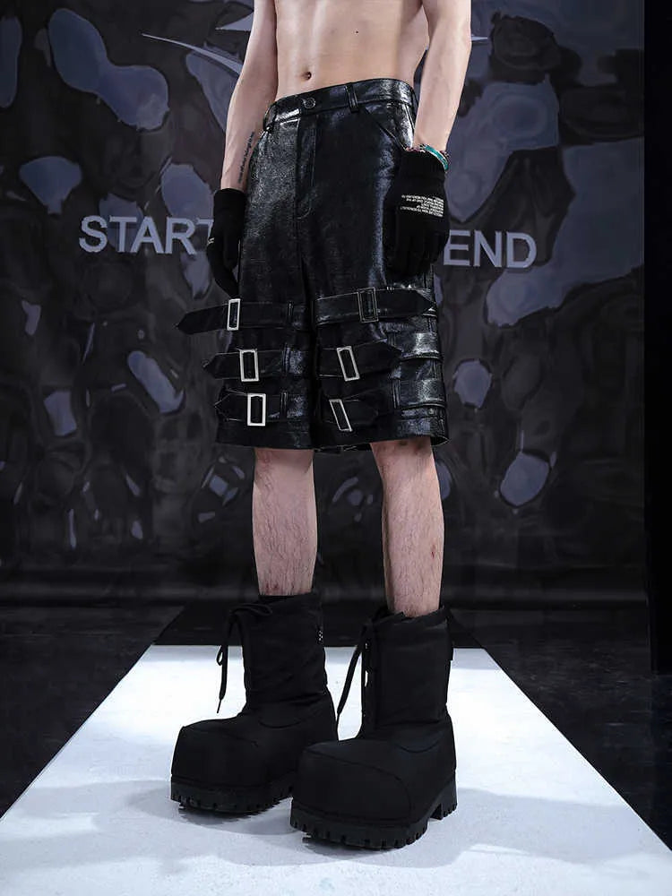 Men's black PU leather cropped pants with leather ring detailing on waistband