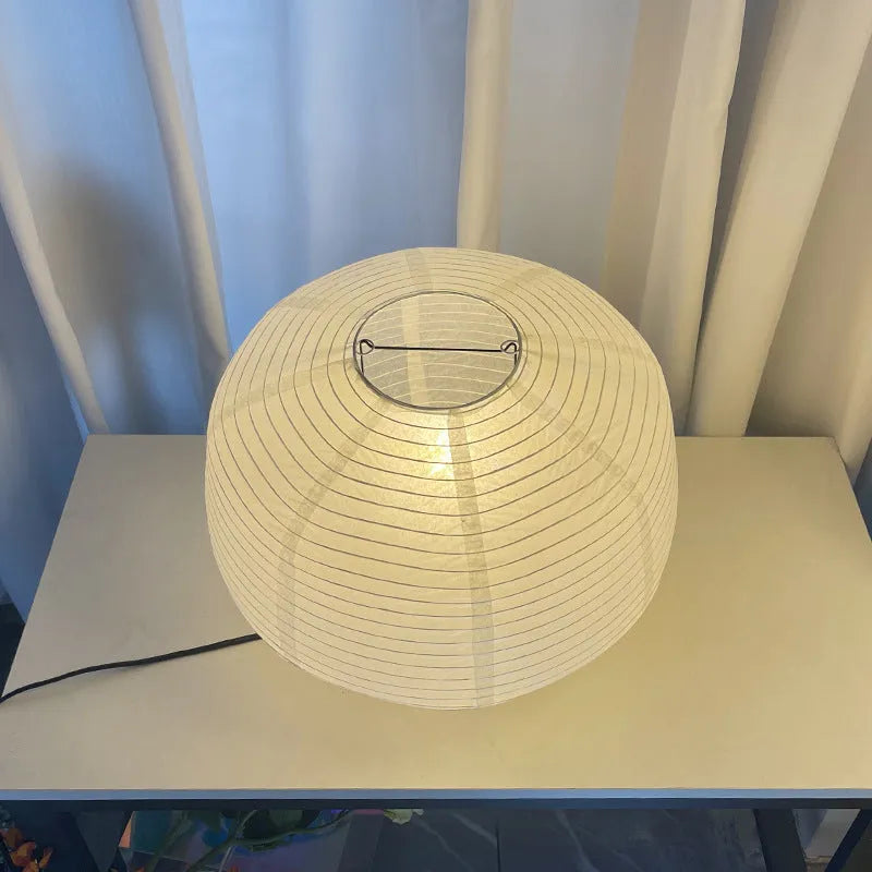 Japanese style Xuan paper table lamp, D39 x H32 cm, with three-colour light source, on a desk.