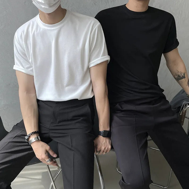 Men's slim fit cotton t-shirt in solid white and black colours with round neck and short sleeves