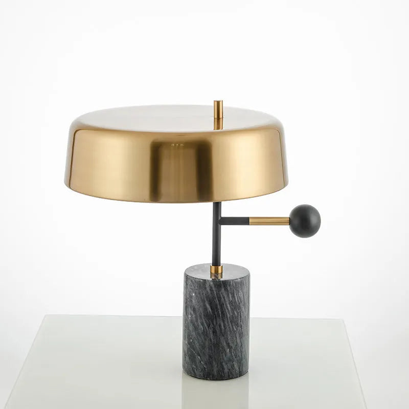 European-style bedside table lamp with warm white lighting on wooden surface