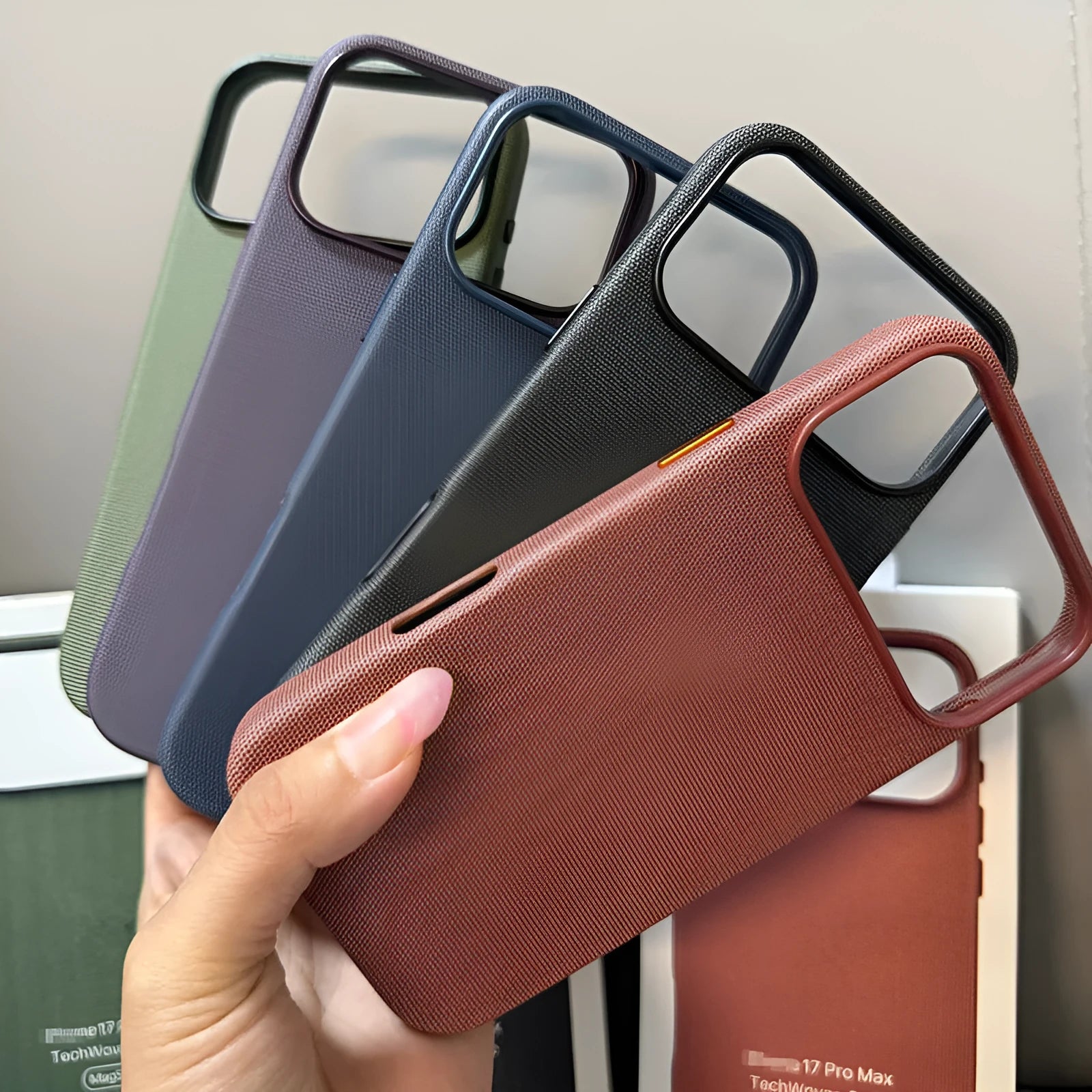 Black woven cloth pattern phone case with magnetic suction animation for iPhone 17 series
