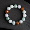 Women's bracelet with round three-colour jade beads, certificate visible.