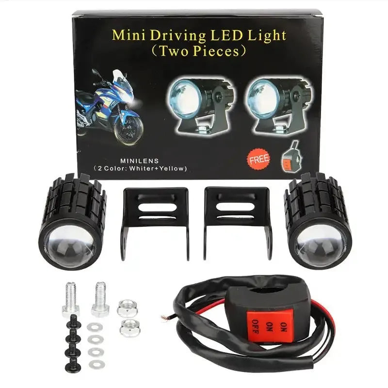 Motorcycle auxiliary spotlight with two-colour lens options, showing aluminium and polycarbonate housing.